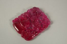 A CHINESE CARVED PINK TOURMALINE PENDANT.