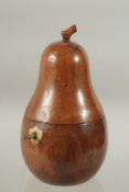 A GOOD PEAR TEA CADDY with stalk and keyhole. 20cms high.