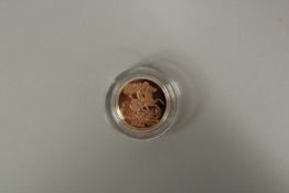 2008. A FULL GOLD PROOF SOVEREIGN in capsule FDC with wooden box and COA plus outer.