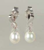A PAIR OF PEARL AND DIAMOND 18ct GOLD DROP EARRINGS.