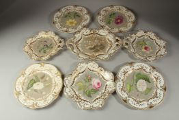 A ROCKINGHAM PORCELAIN PART DESSERT SERVICE painted with flowers, comprising four plates (23cms) and