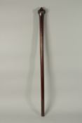 A GOOD POLYNESIAN WOODEN CLUB with cross hatch handle. 104cms long.