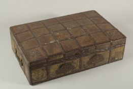 AN EARLY LEATHER CLAD METAL SURROUND DOCUMENT CHEST with domed top and fitted interior. 18ins long.