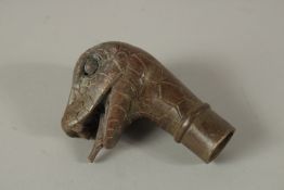 A BRONZE WALKING STICK HANDLE 'SNAKE HEAD'.