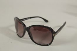A PAIR OF TOM FORD SUNGLASSES, boxed.