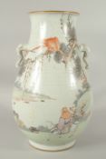 A LARGE CHINESE PORCELAIN MONKEY VASE with elephant handles.