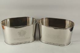 A SMALL PAIR OF LILY BOLLINGER WINE COOLERS. 40cms high.