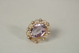 A 15ct GOLD, AMETHYST AND PEARL BROOCH.