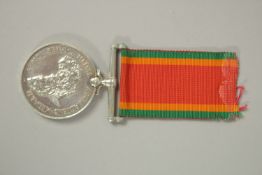 AFRICA SERVICE MEDAL, awarded to 61189 F. A. VAN ST ADEN, with ribbon.
