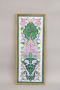 A 20TH CENTURY PERSIAN TILED PANEL.