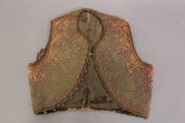 A 19TH CENTURY OTTOMAN SILVER THREADED CHILD'S WAISTCOAT.