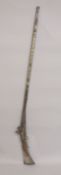 A FINE 18TH-19TH CENTURY MOROCCAN NIELLO SILVER MOUNTED FLINTLOCK RIFLE.