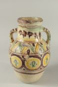 AN 18TH CENTURY NORTH AFRICAN TUNISIAN QALLALINE GLAZED POTTERY JAR.