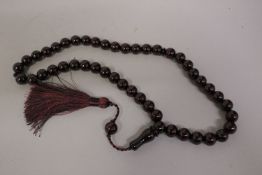 A TURKISH CHERRY BEADED TESBIH.