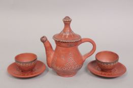A TURKISH TOPHANE COFFEE SET, comprising a teapot and two cups and saucers, (x5 pieces).