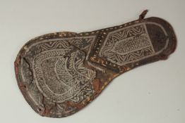 A RARE 19TH CENTURY ARAB POSSIBLY OMANI SILVER THREAD EMBROIDERED LEATHER HORSE SHAMFROM, 39cm