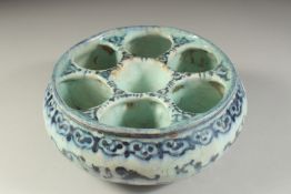 A FINE 16TH-17TH PERSIAN SAFAVID GLAZED POTTERY SECTIONAL BOWL, 22cm diameter..
