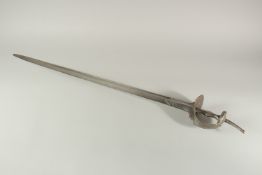 A 17TH CENTURY SOUTH INDIAN FIRANGI SWORD, with openworked basket hilt, 110cm long.
