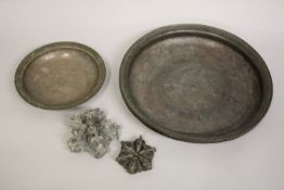 A 17TH CENTURY PERSIAN SAFAVID ENGRAVED COPPER DISH, together with a smaller Persian dish, and two