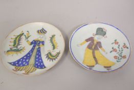 TWO OTTOMAN TURKISH PLATES, painted with figures, (one with hairline), 14.5cm and 15cm diameter.
