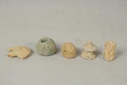 A GROUP OF POSSIBLY ANCIENT ARTIFACTS, including two seals and other pieces.