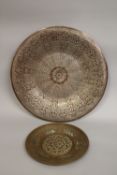 TWO HEAVILY SILVER INLAID CAIROWARE TRAYS, largest 55cm diameter, (2).
