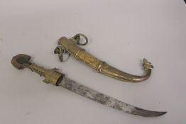A VERY FINE 19TH CENTURY MOROCCAN KOUMAYA DAGGER, with enamelled silver decoration, 41cm long