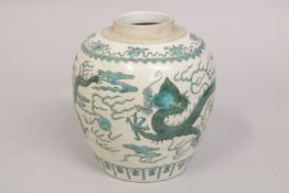 A CHINESE FAMILLE VERTE PORCELAIN DRAGON JAR, the shoulder with a band of lucky symbols, 17.5cm