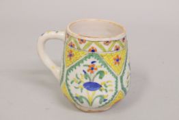 AN OTTOMAN TURKISH KUTAYHA WINE CUP, 10.5cm high.
