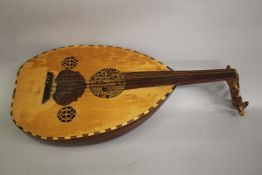 A MIDDLE EASTERN IRAQI OUD WOODEN MUSICAL INSTRUMENT, signed by Mohammad Fadel, label to interior.