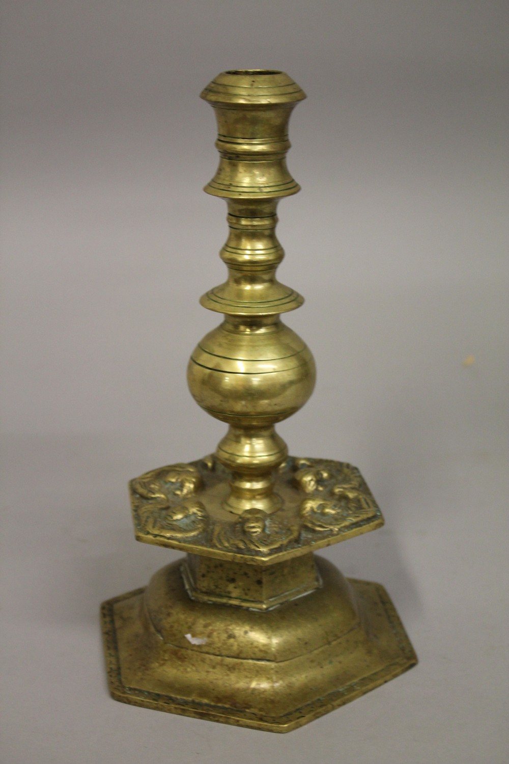 A 17TH-18TH FLEMISH BRASS CANDLESTICK, with cherubs, 28cm high. - Image 2 of 4