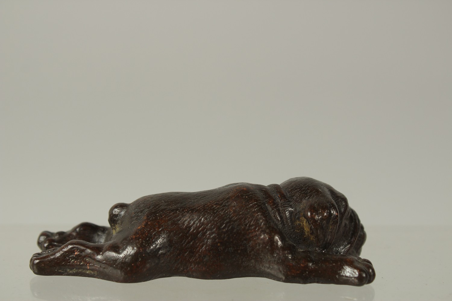 A BRONZE OKIMONO OF A SLEEPING DOG, 9.5cm long. - Image 2 of 3