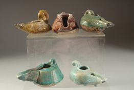 A COLLECTION OF FIVE 12TH-13TH CENTURY PERSIAN GLAZED POTTERY OIL LAMPS, (5)