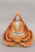 A LARGE CHINESE ORANGE GLAZED DEHUA PORCELAIN BUDDHA, the reverse with character marks, 33cm high.