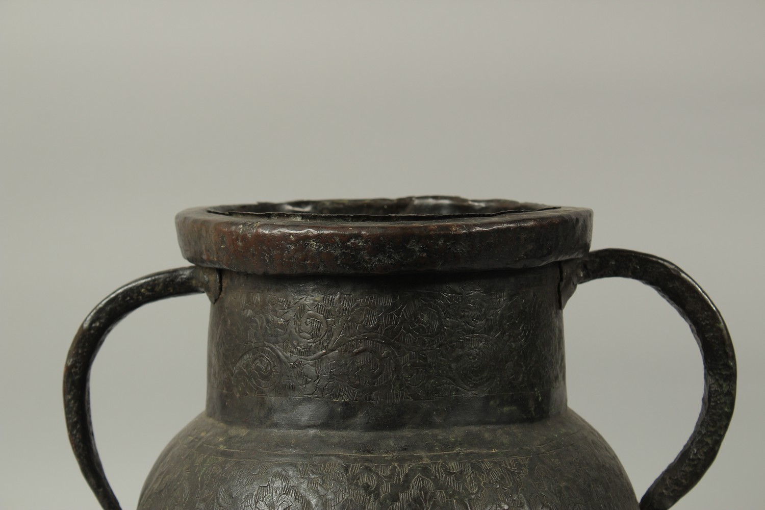 A LARGE EARLY ISLAMIC POSSIBLY SPANISH ADALUSIAN ENGRAVED TWIN HANDLE COPPER JAR, 35cm high. - Image 2 of 8
