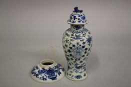 A CHINESE BLUE AND WHITE PORCELAIN JAR AND COVER, with character mark to base, together with a