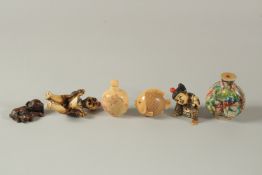 A COLLECTION OF FOUR CHINESE / JAPANESE SNUFF BOTTLES, together with a signed carving of a fish