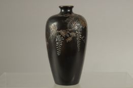 A FINE JAPANESE MIXED METAL INLAID BRONZE VASE, with foliate design, the base with incised mark,
