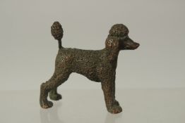 A BRONZE OKIMONO OF A DOG, 5cm long.
