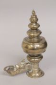 AN 18TH-19TH CENTURY INDIAN BRONZE OIL LAMP, with dragon formed spout, 24cm high.