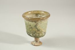 A RARE 10TH-12TH CENTURY ISLAMIC POSSIBLY PERSIAN MOULDED GLASS STEM CUP, with Kufic calligraphy