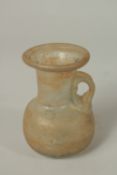 A FINE INTACT POSSIBLY ROMAN GLASS VESSEL, 9cm high.