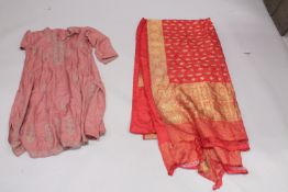 AN INDIAN EMBROIDERED KASHMIRI DRESS, together with another gilt metal threaded sari, (2).