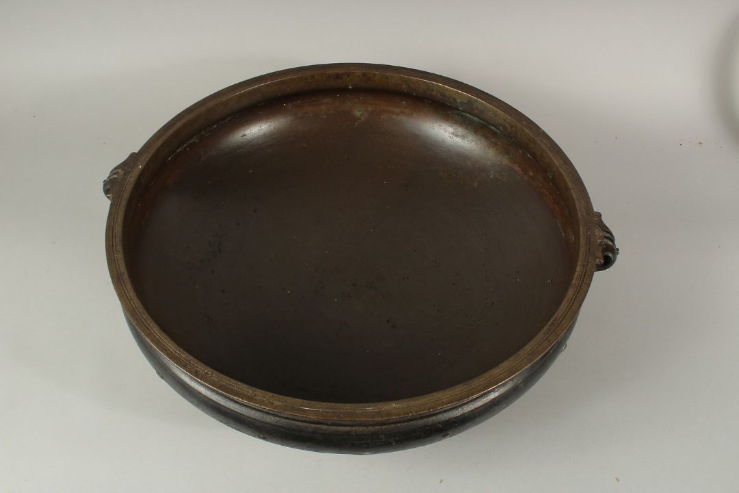 A LARGE 19TH CENTURY INDIAN OR SOUTH EAST ASIAN BRONZE TWIN HANDLE URLI, 59cm diameter. *Note: a - Image 5 of 6