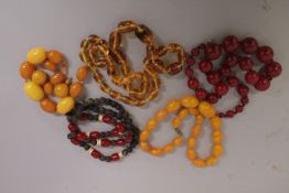 A COLLECTION OF BEADS - some possibly bakelite.
