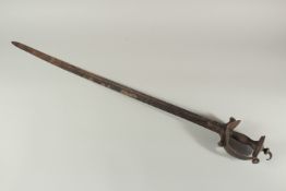 AN EARLY 17TH CENTURY SOUTH INDIAN FIRANGI SWORD, with openworked basket hilt, 100cm long.