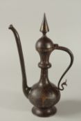 A FINE 19TH CENTURY PERSIAN QAJAR GOLD INLAID STEEL EWER, the handle with dragon head terminal, 35cm