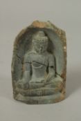 AN ENGRAVED GREY SCHIST STONE CARVING OF BUDDHA.