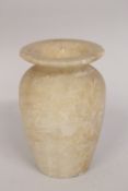 AN ALABASTER JAR - POSSIBLY ANCIENT EYGPTIAN, 19cm high.