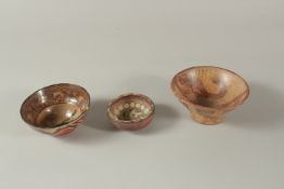 A COLLECTION OF THREE ISLAMIC NORTH AFRICAN POTTERY BOWLS, largest 13cm diameter, (3).